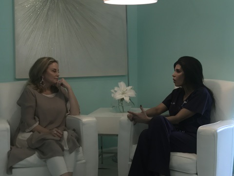 Two people seated in conversation